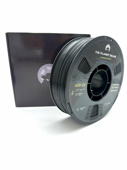 Spool of black 3D printing filament with a branded box on a white background