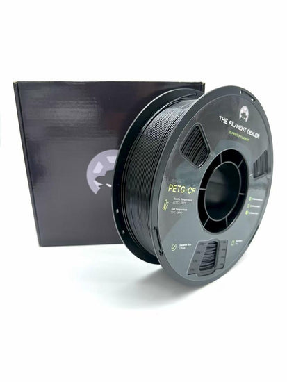 Spool of PETG-CF filament with a black box on a white background