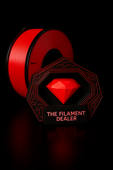 Red spool of filament with 'The Filament Dealer' branding on a black background