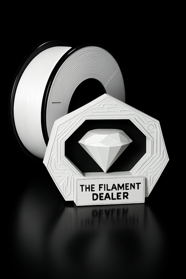 Spool of filament with 'The Filament Dealer' branding on a black background