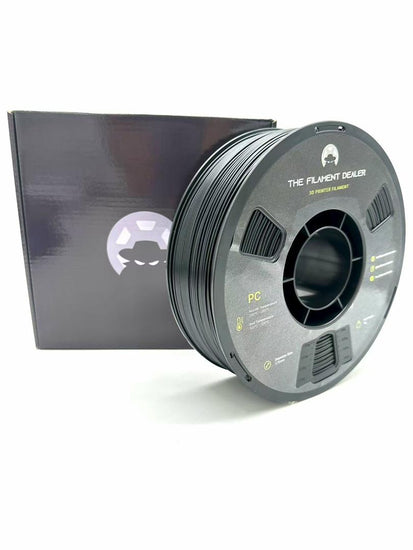 Spool of 3D printing filament with packaging on a white background